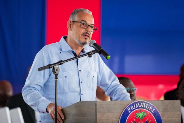 Haitian Prime Minister Alix Didier Fils-Aime speaks during a ceremony where the Haitian Football Federation received qualification bonuses and funds to cover the preparation of the Haitian national team to participate in the 2026 World Cup at the Villa d’Accueil in Port-au-Prince, on April 8, 2026. (Photo by Clarens SIFFROY / AFP)