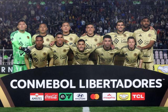 Cusco players pose for a team photo ahead of the Copa Libertadores group stage football match between Peru's Cusco FC and Brazil's Flamengo at the Inca Garcilaso de la Vega stadium in Cusco, Peru, on April 8, 2026. (Photo by Diego RAMOS / AFP)