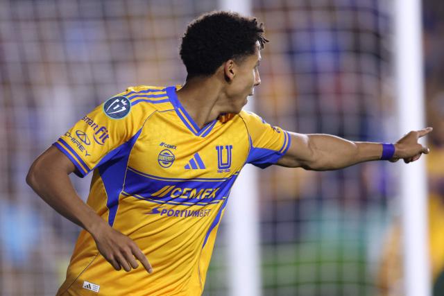 Tigres' forward #77 Ozziel Herrera celebrates scoring his team's first goal during the CONCACAF Champions Cup quarterfinal football match between Mexico's Tigres and US' Seattle Sounders at the Universitario stadium in San Nicolas de los Garza, state of Nuevo Leon, Mexico on April 8, 2026. (Photo by Julio Cesar AGUILAR / AFP)