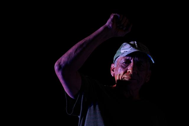 Antauro Humala, brother of former Peruvian President Ollanta Humala, gestures during the closing campaign rally of Peru's presidential candidate Roberto Sanchez, for the Juntos por el Peru party, at 2 de Mayo Square in Lima on April 8, 2026. Peru will hold presidential elections on April 12. (Photo by Ernesto BENAVIDES / AFP)