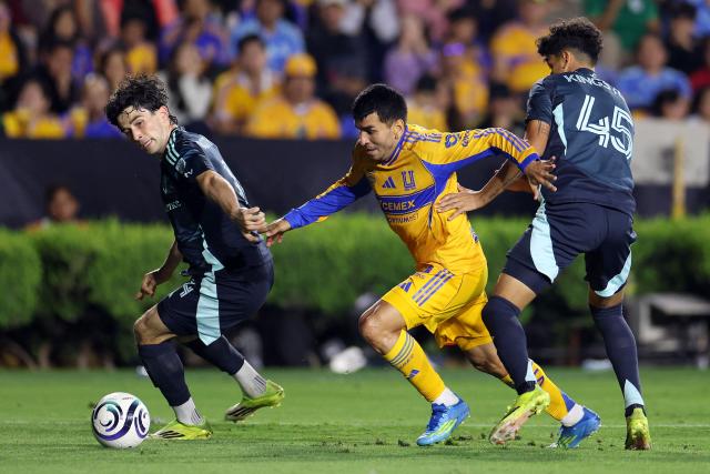 Seattle Sounders' forward #14 Paul Rothrock, Tigres' Argentine forward #07 Angel Correa and Seattle Sounders' midfielder #45 Peter Kingston fight for the ball during the CONCACAF Champions Cup quarterfinal football match between Mexico's Tigres and US' Seattle Sounders at the Universitario stadium in San Nicolas de los Garza, state of Nuevo Leon, Mexico on April 8, 2026. (Photo by Julio Cesar AGUILAR / AFP)