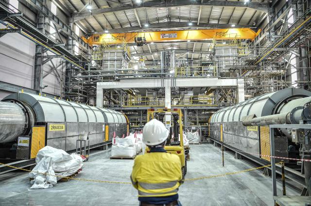 An employee stands during a visit of the facility of Australian mining firm Lynas in eastern Malaysia's Gebeng on April 8, 2026. Australian mining firm Lynas plans to expand its portfolio of rare earths extracted in Malaysia, as it hopes to bolster its position as a key alternative supplier to China. (Photo by Arif Kartono / AFP)