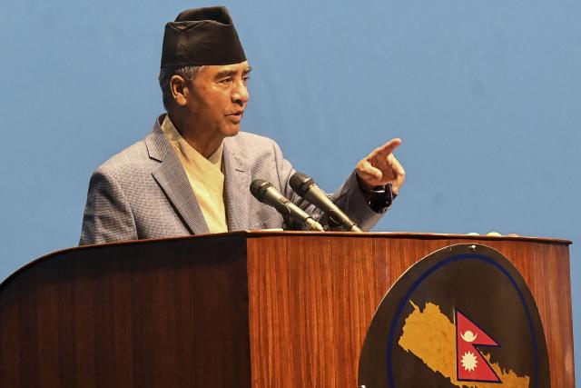 (FILES) Nepal's newly appointed Prime Minister Sher Bahadur Deuba addresses the parliament asking for a vote of confidence in Kathmandu on July 18, 2021. Nepal has issued an arrest warrant for former prime minister Sher Bahadur Deuba for alleged corruption, officials said on April 9, 2026 making him the latest high-profile figure targeted under the new government. (Photo by Prakash MATHEMA / AFP)