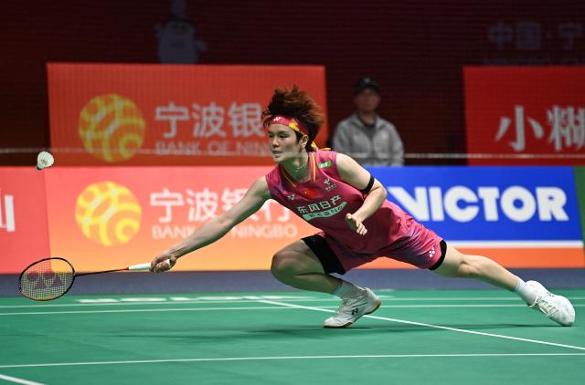 Wang Zhiyi of China hits a return to Pusarla V. Sindhu of India during their women's singles match at the Badminton Asia Championship in Ningbo, eastern China's Zhejiang province on April 9, 2026. (Photo by CN-STR / AFP) / China OUT