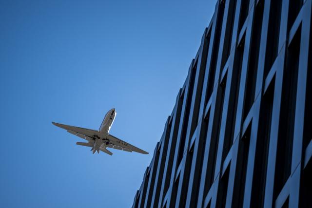 This photograph shows a Citation Latitude aircraft, registration CS-LTH, operated by the business jet charter company NetJets Europe, landing at Sion Airport in western Switzerland on April 8, 2026. (Photo by Fabrice COFFRINI / AFP)