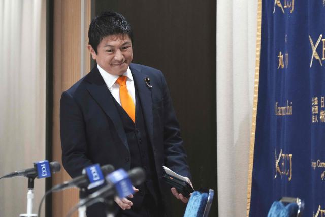 Japan's Sanseito leader Sohei Kamiya arrives at the Foreign Correspondents' Club of Japan to hold a press conference in Tokyo on April 9, 2026. (Photo by Kazuhiro NOGI / AFP)