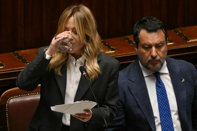 Italy's Prime Minister, Giorgia Meloni drinks water as she addresses the lower house of the Italian Parliament, in Rome on April 9, 2026. (Photo by Andreas SOLARO / AFP)