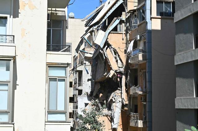 This picture taken on April 9, 2026, shows the aftermath of the previous day's Israeli airstrike that targeted a building in Beirut's al-Manara neighbourhood. The Israeli military said it struck a Hezbollah commander in Beirut on April 8, after Lebanese state media reported that Israel had targeted a residential neighbourhood in the capital. (Photo by FADEL itani / AFP)
