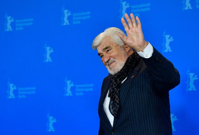 (FILES) German actor and protagonist of the film Mario Adorf waves to for photographers during a photocall for the film "It Could Have Been Worse – Mario Adorf" (Es haette schlimmer kommen koennen - Mario Adorf) at the 69th Berlinale film festival on February 12, 2019 in Berlin. Actor Mario Adorf has died at the age of 95 on April 8, 2026, his longtime manager Michael Stark announced on April 9, 2026. He “passed away in his sleep in his apartment in Paris on Wednesday after a short illness,” he said. (Photo by Tobias SCHWARZ / AFP)