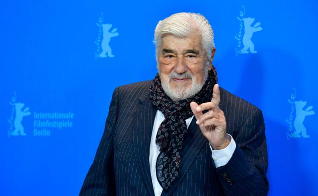 (FILES) German actor and protagonist of the film Mario Adorf poses for photographers during a photocall for the film "It Could Have Been Worse – Mario Adorf" (Es haette schlimmer kommen koennen - Mario Adorf) at the 69th Berlinale film festival on February 12, 2019 in Berlin. Actor Mario Adorf has died at the age of 95 on April 8, 2026, his longtime manager Michael Stark announced on April 9, 2026. He “passed away in his sleep in his apartment in Paris on Wednesday after a short illness,” he said. (Photo by Tobias SCHWARZ / AFP)
