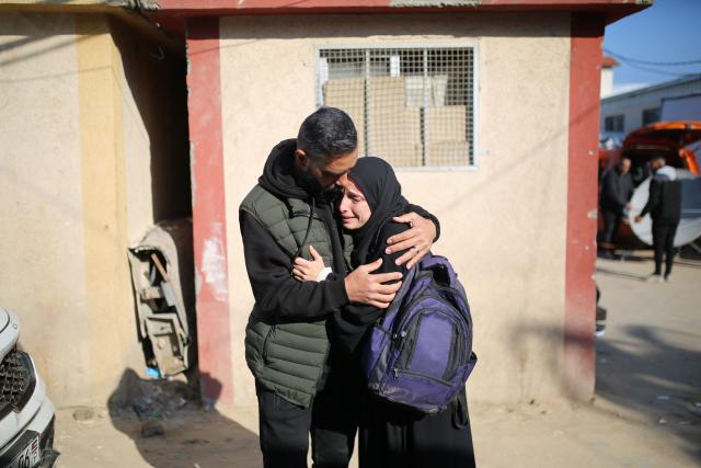 The sister of Al Jazeera journalist Mohammad Wishah, who was killed in an Israeli strike, mourns during his funeral at the Al-Aqsa Martyrs Hospital in Deir al-Balah in the central Gaza Strip, on April 9, 2026. Al Jazeera reported on April 8 that one of its journalists, Mohammed Wishah, was killed when an Israeli drone strike targeted his car in Gaza. “Al Jazeera correspondent Mohammed Wishah was martyred in the Gaza Strip after an Israeli drone targeted his car,” the channel said. (Photo by Eyad Baba / AFP)