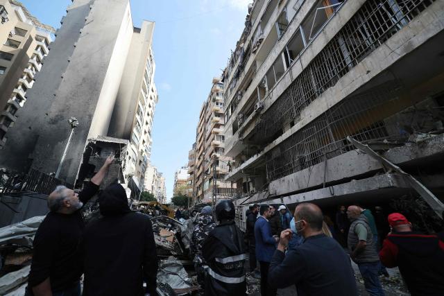 Lebanese rescuers inspect the site of an Israeli airstrike that targeted a building the day before in Beirut's Corniche al-Mazraa neighbourhood on April 9, 2026. Rescuers searched for survivors under the rubble of destroyed buildings in Beirut as Lebanon observed a day of mourning after Israeli strikes across the country killed more than 200. (Photo by Ibrahim AMRO / AFP)
