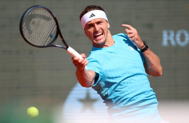 Germany's Alexander Zverev plays a forehand return to Belgium's Zizou Bergs during their Monte Carlo ATP Masters Series Tournament round of 16 tennis match on Court Rainier III at the Monte-Carlo Country Club in Roquebrune-Cap-Martin, south-eastern France on April 9, 2026. (Photo by Valery HACHE / AFP)
