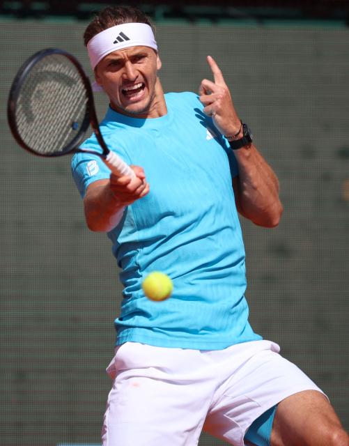Germany's Alexander Zverev plays a forehand return to Belgium's Zizou Bergs during their Monte Carlo ATP Masters Series Tournament round of 16 tennis match on Court Rainier III at the Monte-Carlo Country Club in Roquebrune-Cap-Martin, south-eastern France on April 9, 2026. (Photo by Valery HACHE / AFP)