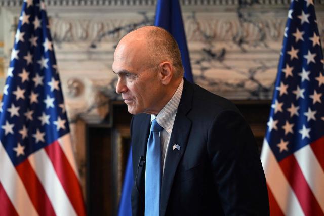 United States Ambassador to the European Union Andrew Puzder looks on during an interview in Brussels on April 9, 2026. (Photo by Nicolas TUCAT / AFP)