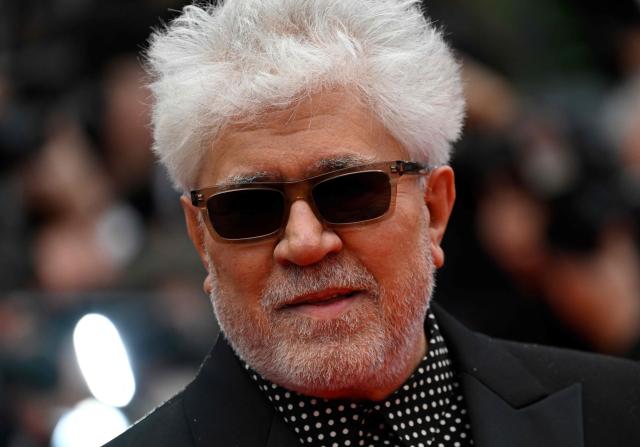 (FILES) Spanish film director Pedro Almodovar arrives for the screening of the film "Extrana Forma de Vida" (Strange Way of Life) during the 76th edition of the Cannes Film Festival in Cannes, southern France, on May 17, 2023. Iranian filmmaker Asghar Farhadi, Pedro Almodovar – making his seventh appearance in the competition – exiled Russian director Andrei Zvyagintsev, and previous winners Hirokazu Kore-eda and Cristian Mungiu will be vying for the Palme d’Or at the 79th Cannes Film Festival. The selection, announced on April 9, 2026, includes just one US director, Ira Sachs, whilst the major Hollywood studios are notably absent from this year’s festival, which will take place from May 12 to 23, 2026. (Photo by Patricia DE MELO MOREIRA / AFP)