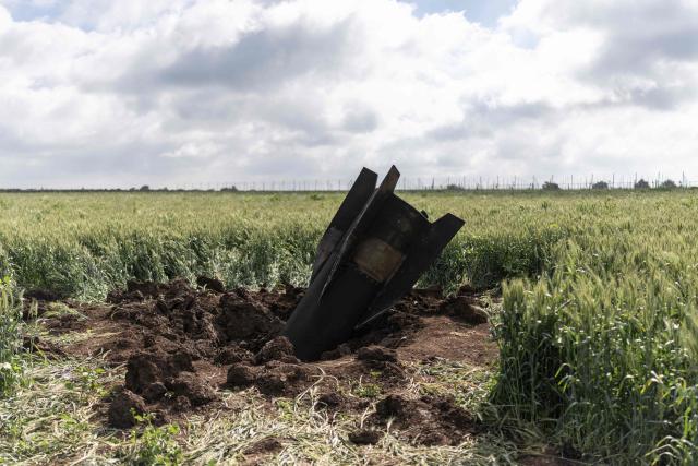 Remnats of an Iranian missile are pictured near the border between the Israeli-annexed Golan Heights and Syria on April 9, 2026. Israel vowed more strikes against Hezbollah on April 9, dismissing mounting international demands that the fragile truce between the United States and Iran in the Gulf be expanded to cover the war in Lebanon. (Photo by Ilia YEFIMOVICH / AFP)