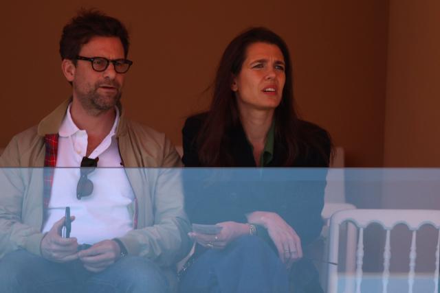 Charlotte Casiraghi (R) and her partner French writer Nicolas Mathieu attend the match opposing Italy's Jannik Sinner and Czech Republic's Tomas Machac during their Monte Carlo ATP Masters Series Tournament round of 16 tennis match on Court Rainier III at the Monte-Carlo Country Club in Roquebrune-Cap-Martin, south-eastern France on April 9, 2026. (Photo by Valery HACHE / AFP) / / NO TABLOIDS WEB & PRINT, NO DAILY MAIL, NO DAILY MAIL GROUP, NO VOICI, NO CLOSER
