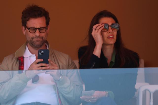 Charlotte Casiraghi (R) and her partner French writer Nicolas Mathieu attend the match opposing Italy's Jannik Sinner and Czech Republic's Tomas Machac during their Monte Carlo ATP Masters Series Tournament round of 16 tennis match on Court Rainier III at the Monte-Carlo Country Club in Roquebrune-Cap-Martin, south-eastern France on April 9, 2026. (Photo by Valery HACHE / AFP) / / NO TABLOIDS WEB & PRINT, NO DAILY MAIL, NO DAILY MAIL GROUP, NO VOICI, NO CLOSER