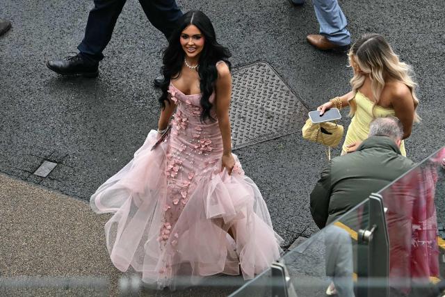 Racegoers attend the opening day of the Grand National Festival horse race meeting at Aintree Racecourse in Liverpool, north-west England, on April 9, 2026. (Photo by Paul ELLIS / AFP)