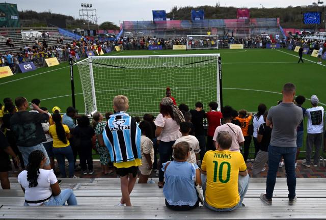People attend the Legends Football Tournament in Willemstad, Curacao, in the Dutch Caribbean, on April 8, 2026. (Photo by Raul ARBOLEDA / AFP)