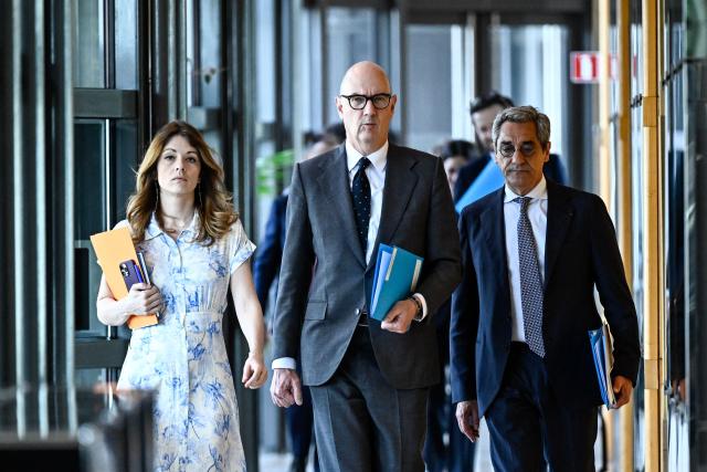 France's Government Spokesperson Maud Bregeon (L), France's Economy and Finance Minister Roland Lescure (C) and France's Trade Minister Serge Papin (R) arrive for a ministers meeting with fuel distributors at the Bercy finance ministry in Paris on April 9, 2026. (Photo by JULIEN DE ROSA / AFP)