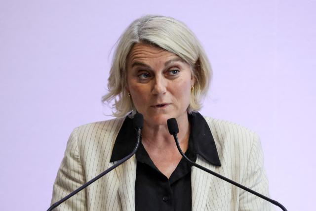 France's Health Minister Stephanie Rist speaks during a press conference to present the plan to reduce absenteeism at work, in Paris on April 9, 2026. France's Health Minister confirmed to the National Assembly on April 1, 2026 that the government is preparing to announce measures to curb the current rise in sick pay, which is "no longer sustainable" for the National Health Service. This also includes making it easier for employers to monitor absenteeism and providing employers with guidelines on best practice regarding working conditions. (Photo by Ludovic MARIN / AFP)