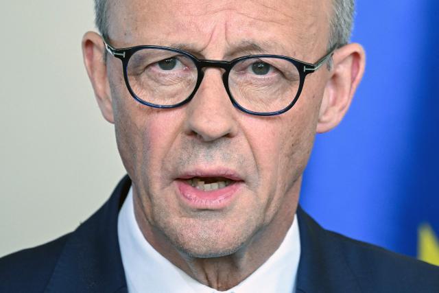 German Chancellor Friedrich Merz addresses a press conference on domestic and foreign policy issues at the Chancellery in Berlin on April 9, 2026. (Photo by RALF HIRSCHBERGER / AFP)