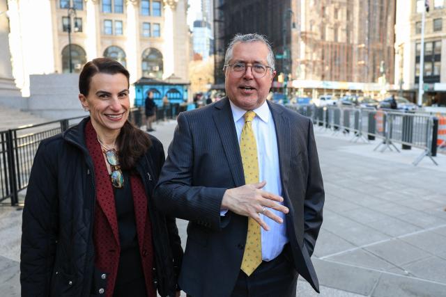 (L/R) Karen Agnifilo and Marc Agnifilo, attorneys for Sean "Diddy" Combs," speak as they arrive at the Thurgood Marshall US Courthouse in New York on April 9, 2026. Combs is appealing his 50-month prison sentence after being convicted of transporting prostitutes across state lines in October 2025. (Photo by TIMOTHY A.CLARY / AFP)