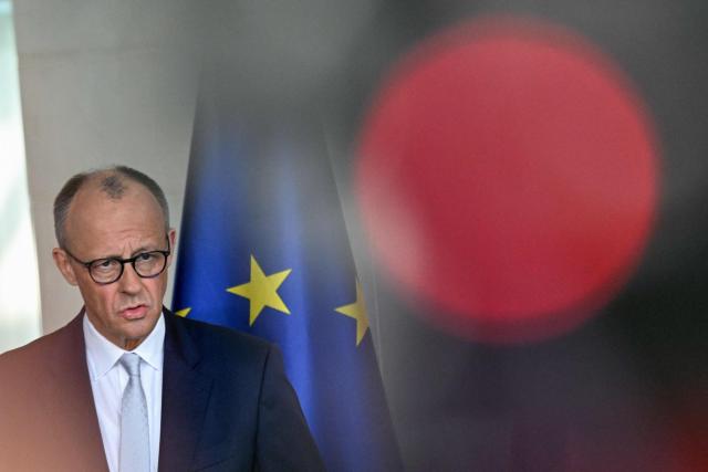 German Chancellor Friedrich Merz addresses a press conference on domestic and foreign policy issues at the Chancellery in Berlin on April 9, 2026. (Photo by RALF HIRSCHBERGER / AFP)