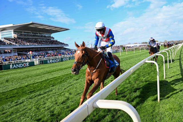 Jockey Jonathan Burke wins the Red Rum Handicap Chase on Ryan's Rocket during the opening day of the Grand National Festival horse race meeting at Aintree Racecourse in Liverpool, north-west England, on April 9, 2026. (Photo by Paul ELLIS / AFP)