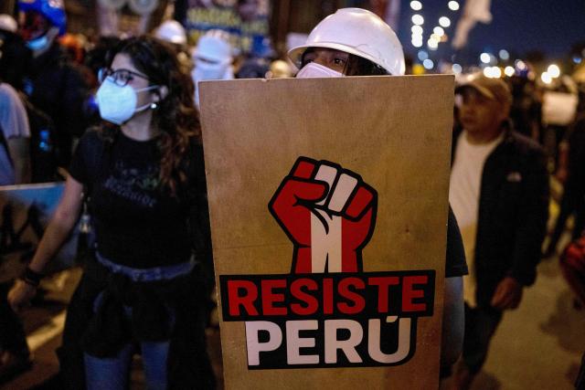 (FILES) Demonstrators take part in a protest against the government of Peru's President Jose Jeri in Lima on November 14, 2025. Decisive yet disillusioned, Peru's young people will be key in the April 12, 2026, election to choose a president from a record field of 35 candidates, but with no options that excite them. (Photo by Ernesto BENAVIDES / AFP)