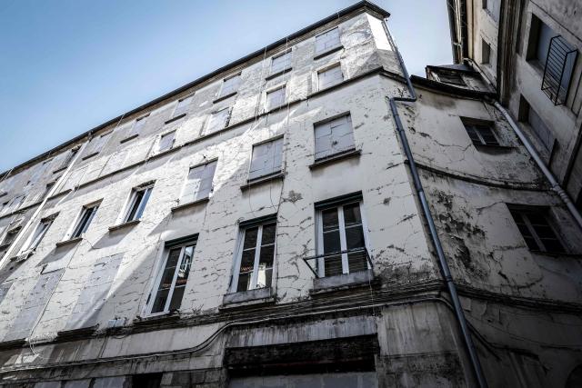 This photograph shows an unsanitary housing building in central Paris on April 9, 2026. (Photo by STEPHANE DE SAKUTIN / AFP)