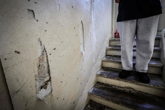 This photograph shows inside an unsanitary housing building in central Paris on April 9, 2026. (Photo by STEPHANE DE SAKUTIN / AFP)