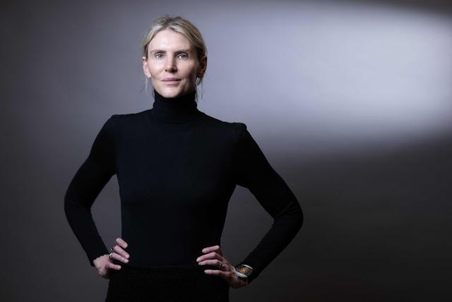 (FILES) Uruguayan women's luxury ready-to-wear and accessories designer, Gabriela Hearst, poses during a photo session as part of the 8th Paris Peace Forum in Paris, on October 29, 2025. The Uruguayan national team will head to the 2026 World Cup in custom-made uniforms crafted from merino wool by designer Gabriela Hearst, one of the leading ambassadors of sustainable luxury in fashion, the Uruguayan Football Association (AUF) celebrated on April 9, 2026, on its social media. (Photo by JOEL SAGET / AFP)
