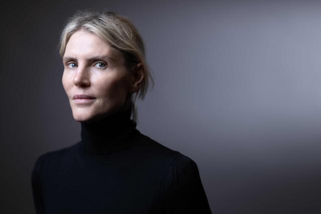 (FILES) Uruguayan women's luxury ready-to-wear and accessories designer, Gabriela Hearst, poses during a photo session as part of the 8th Paris Peace Forum in Paris, on October 29, 2025. The Uruguayan national team will head to the 2026 World Cup in custom-made uniforms crafted from merino wool by designer Gabriela Hearst, one of the leading ambassadors of sustainable luxury in fashion, the Uruguayan Football Association (AUF) celebrated on April 9, 2026, on its social media. (Photo by JOEL SAGET / AFP)