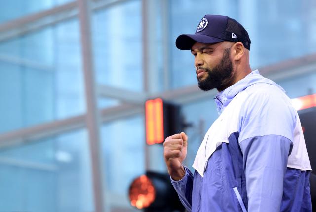 British boxer Frazer Clarke poses during a press conference in central London on April 9, ahead of the his boxing match with Australian boxer Justis Huni on April 11. (Photo by Toby Shepheard / AFP)