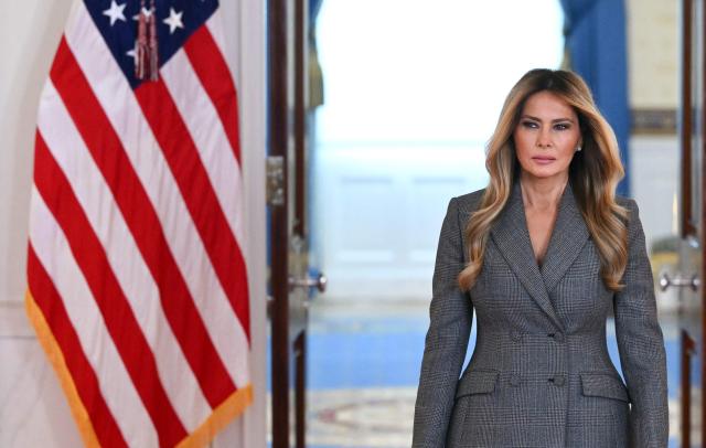 US First Lady Melania Trump arrives in the White House Cross Hall in Washington, DC, on April 9, 2026, ahead of a statement denying any links to the late convicted sex offender Jeffrey Epstein and his abuse. (Photo by Mandel NGAN / AFP)