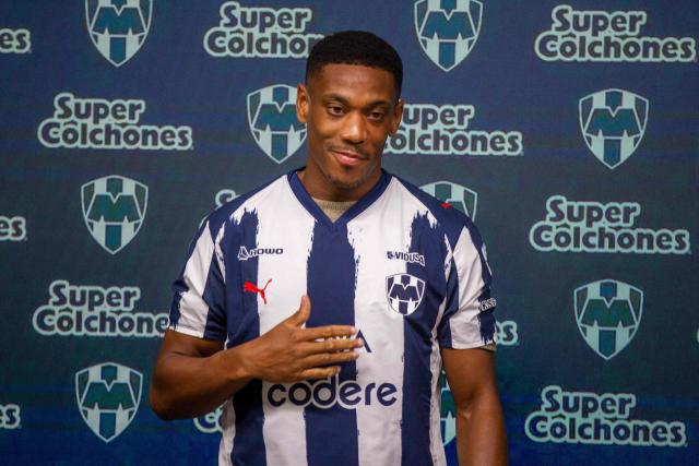 (FILES) French forward Anthony Martial poses for a photo wearing Monterrey's jersey during his presentation at the BBVA Stadium in Monterrey, Nuevo Leon state, Mexico on September 19, 2025. The buzz surrounding his arrival in Mexico has given way to silence. French striker Anthony Martial has gone largely unnoticed in Monterrey, a far cry from the glorious legacy left by his compatriot André-Pierre Gignac on Mexican soil. (Photo by Julio Cesar AGUILAR / AFP)