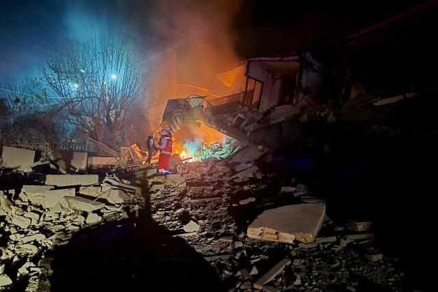 First responders look for survivors at the site of an Israeli airstrike that targeted the southern Lebanese village of Choukine on April 9, 2026. A Hezbollah lawmaker on April 9 reiterated his group's rejection of any direct negotiations between Lebanon and Israel, after Israeli Prime Minister Benjamin Netanyahu said he had ordered his cabinet to begin talks with Beirut. (Photo by Abbas FAKIH / AFP)