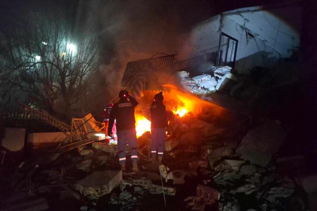 First responders look for survivors at the site of an Israeli airstrike that targeted the southern Lebanese village of Choukine on April 9, 2026. A Hezbollah lawmaker on April 9 reiterated his group's rejection of any direct negotiations between Lebanon and Israel, after Israeli Prime Minister Benjamin Netanyahu said he had ordered his cabinet to begin talks with Beirut. (Photo by Abbas FAKIH / AFP)