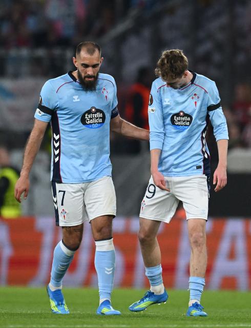 Celta Vigo's Spanish forward #07 Borja Iglesias (L) and Celta Vigo's Spanish forward #09 Ferran Jutlga react during the UEFA Europa League Quarter final First Leg football match between SC Freiburg and Celta Vigo in Freiburg, on April 9, 2026. (Photo by Silas STEIN / AFP)