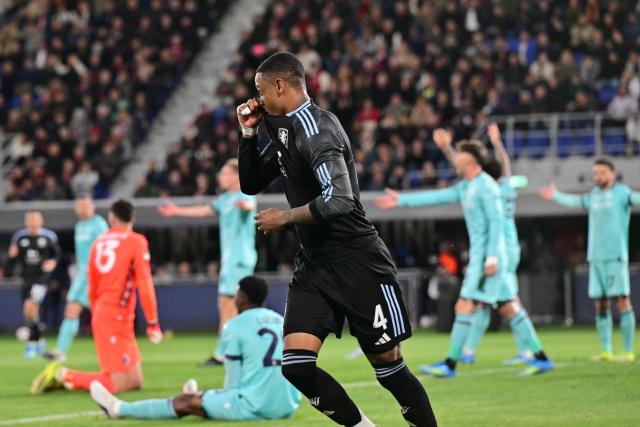 Aston Villa's English defender #04 Ezri Konsa celebrates scoring his team's first goal during the UEFA Europa League quarter final first leg football match between Bologna and Aston Villa at the Renato Dall'Ara stadium in Bologna on April 9, 2026. (Photo by Stefano RELLANDINI / AFP)