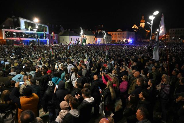 People attend a campaign rally of the TISZA (Respect and Freedom) party on April 9, 2026 in Gyor, ahead of the April 12 election. (Photo by Attila KISBENEDEK / AFP)