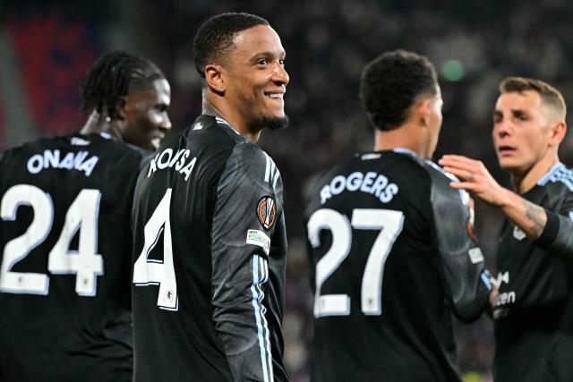 Aston Villa's English defender #04 Ezri Konsa celebrates scoring his team's first goal during the UEFA Europa League quarter final first leg football match between Bologna and Aston Villa at the Renato Dall'Ara stadium in Bologna on April 9, 2026. (Photo by Stefano RELLANDINI / AFP)