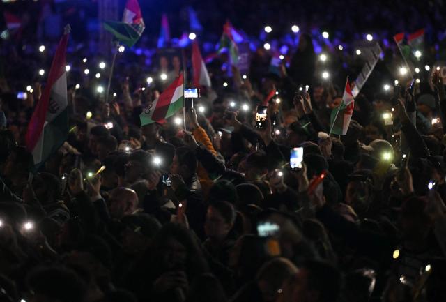 People attend a campaign rally of the TISZA (Respect and Freedom) party on April 9, 2026 in Gyor, ahead of the April 12 election. (Photo by Attila KISBENEDEK / AFP)