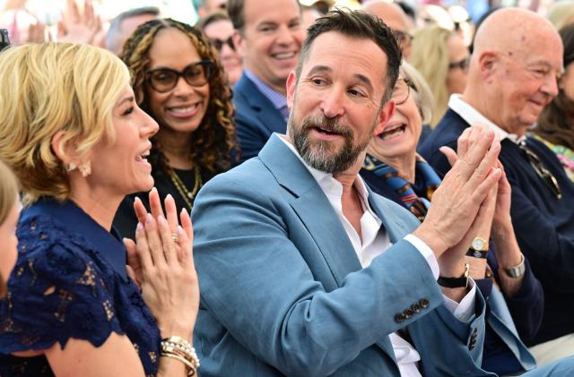 US actor Noah Wyle and his wife Sara Wells (L) react during his Walk of Fame star ceremony in Hollywood, California on April 9, 2026. (Photo by Frederic J. BROWN / AFP)