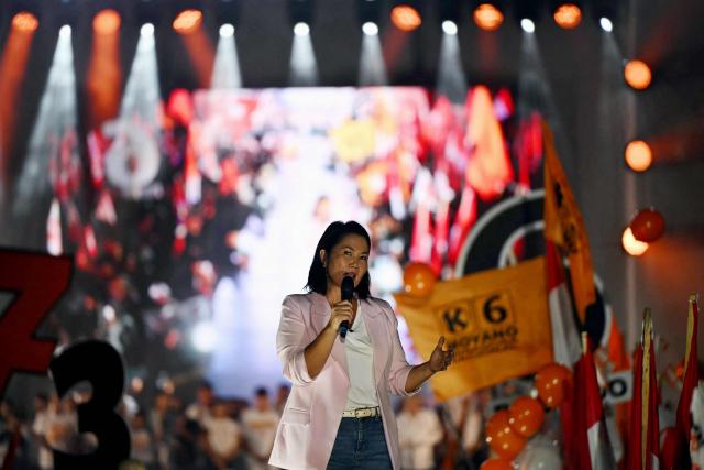 Peru's presidential candidate Keiko Fujimori, for the Fuerza Popular party, speaks to supporters during her closing campaign rally at Villa el Salvador in Lima on April 9, 2026. Peru will hold presidential elections on April 12. (Photo by ERNESTO BENAVIDES / AFP)