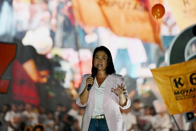 Peru's presidential candidate Keiko Fujimori, for the Fuerza Popular party, speaks to supporters during her closing campaign rally at Villa el Salvador in Lima on April 9, 2026. Peru will hold presidential elections on April 12. (Photo by ERNESTO BENAVIDES / AFP)