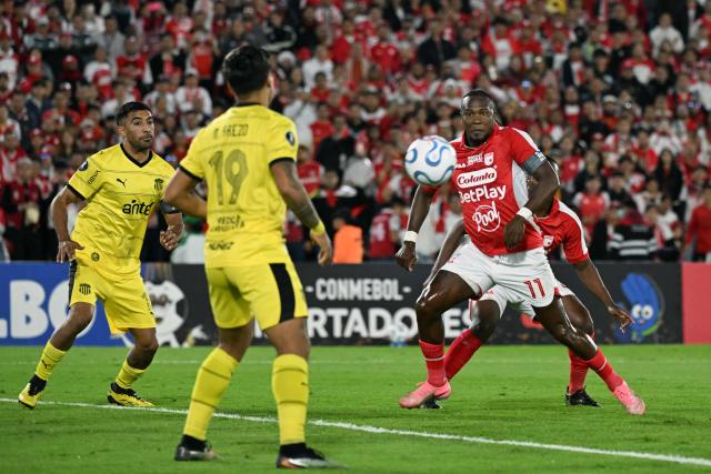 Santa Fe's forward #11 Hugo Rodallega looks at the ball during the Copa Libertadores group stage football match between Colombia's Independiente Santa Fe and Uruguay's Penarol at the Nemesio Camacho El Campin stadium in Bogota, on April 9, 2026. (Photo by Luis ACOSTA / AFP)